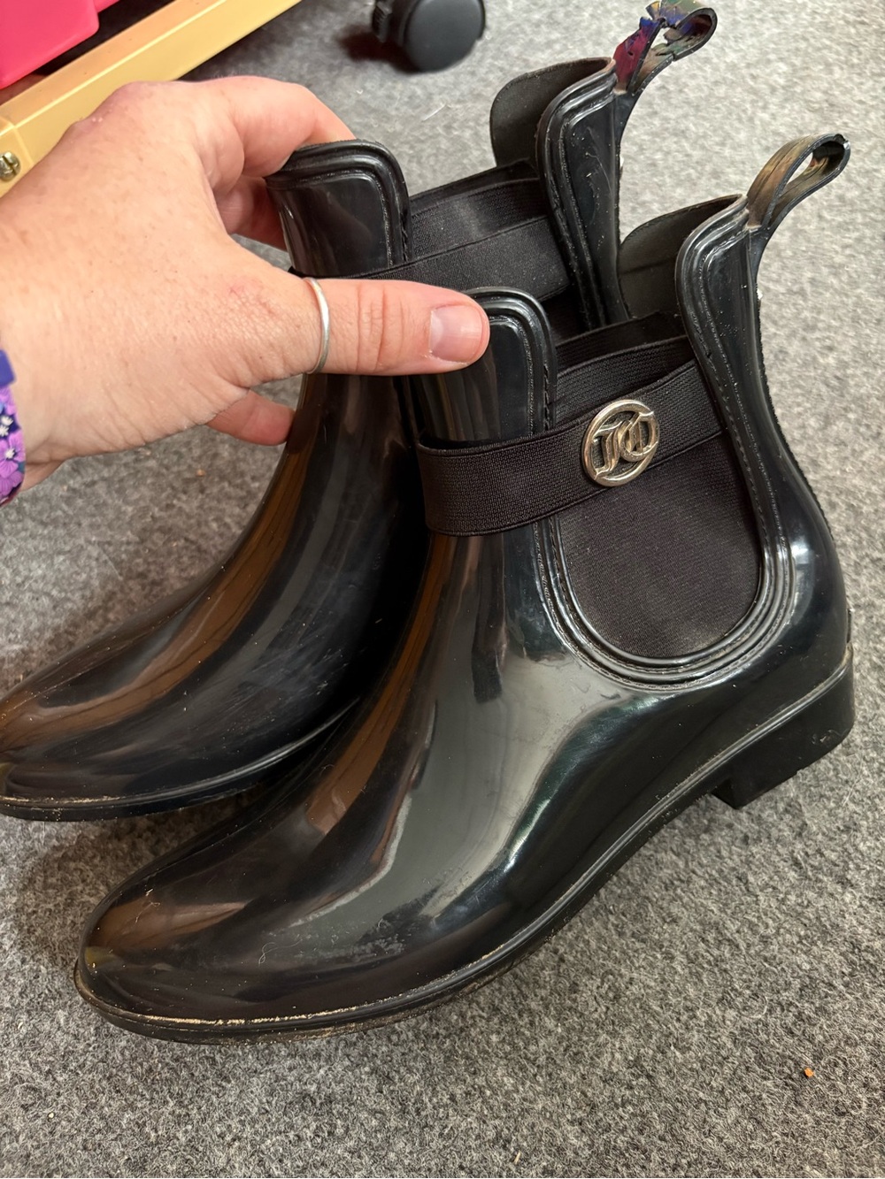 Juicy Couture Glossy Black Chelsea Rain Ankle Boots with Silver Emblem